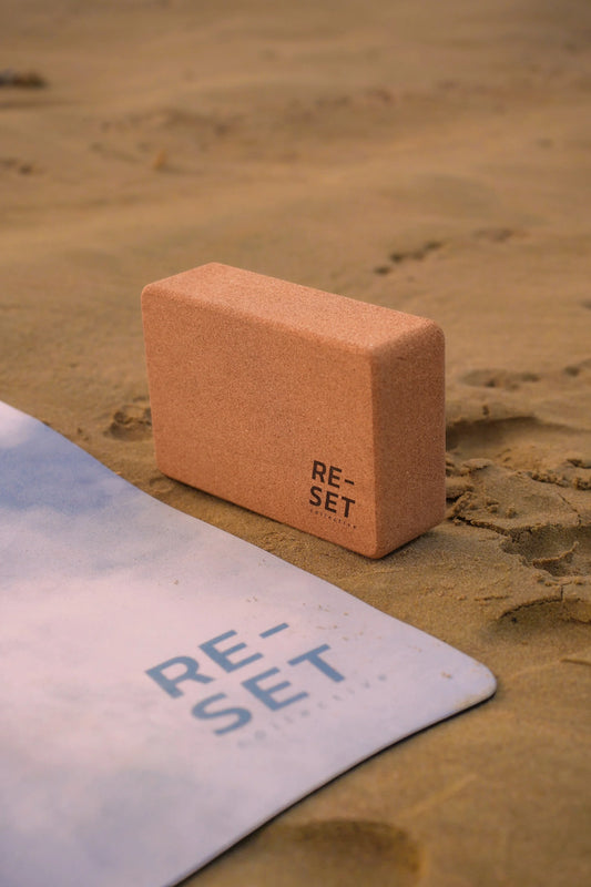 Person using yoga blocks to support their yoga practice